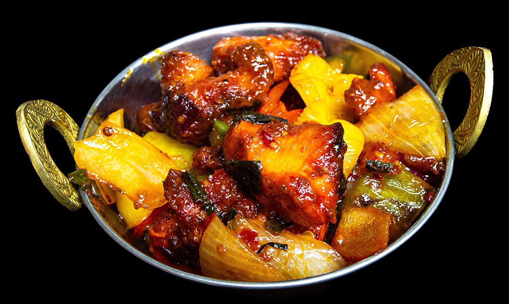 Spicy chicken chili stir-fry with bell peppers and onions