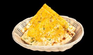 Garlic cheese naan topped with fresh garlic and melted cheese