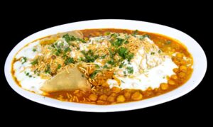 Samosa chaat topped with chickpeas, chutneys, yogurt, and spices at Indian Bites in Lyons, Boulder, Longmont, and Estes Park