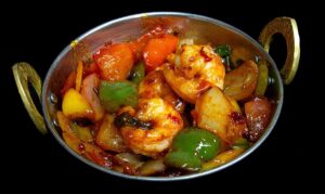 Spicy shrimp chili stir-fry with bell peppers and onions