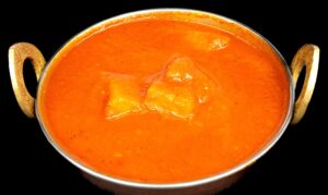 Spicy potato curry in tangy vindaloo sauce with Indian spices – Indian Bites in Lyons