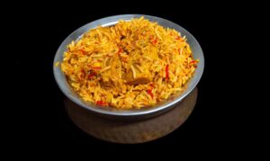 Fragrant chicken biryani with basmati rice, spices, and fresh herbs – Indian Bites in Lyons