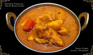 Spicy chicken curry in tangy Goan vindaloo sauce with Indian spices – Indian Bites in Lyons
