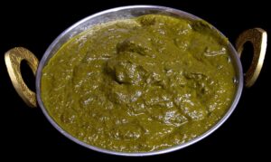 Soft paneer cubes cooked with creamy spinach and aromatic spices