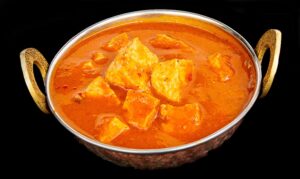 Soft tofu cubes simmered in flavorful Indian spiced curry gravy