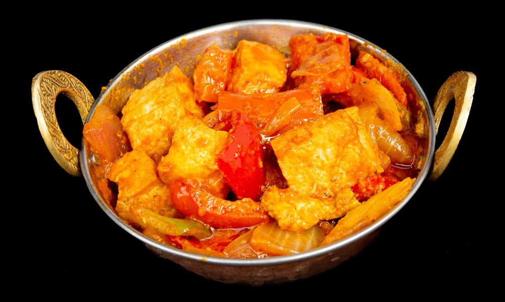 Soft tofu cubes cooked in spicy tomato-based karahi sauce with peppers and onions – Indian Bites in Lyons