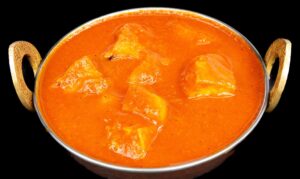 Spicy tofu cubes simmered in tangy Goan vindaloo sauce with Indian spices – Indian Bites in Lyons
