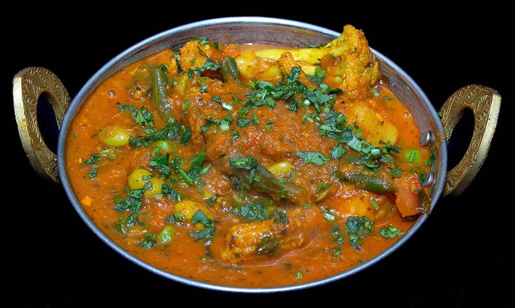 Mixed vegetables simmered in flavorful Indian spiced curry gravy